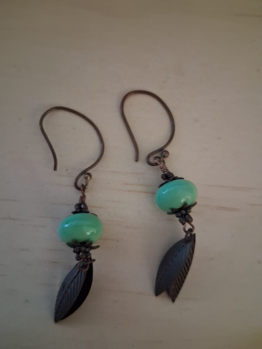 Green Glass Bead Dangle Earrings with Leaf Charm